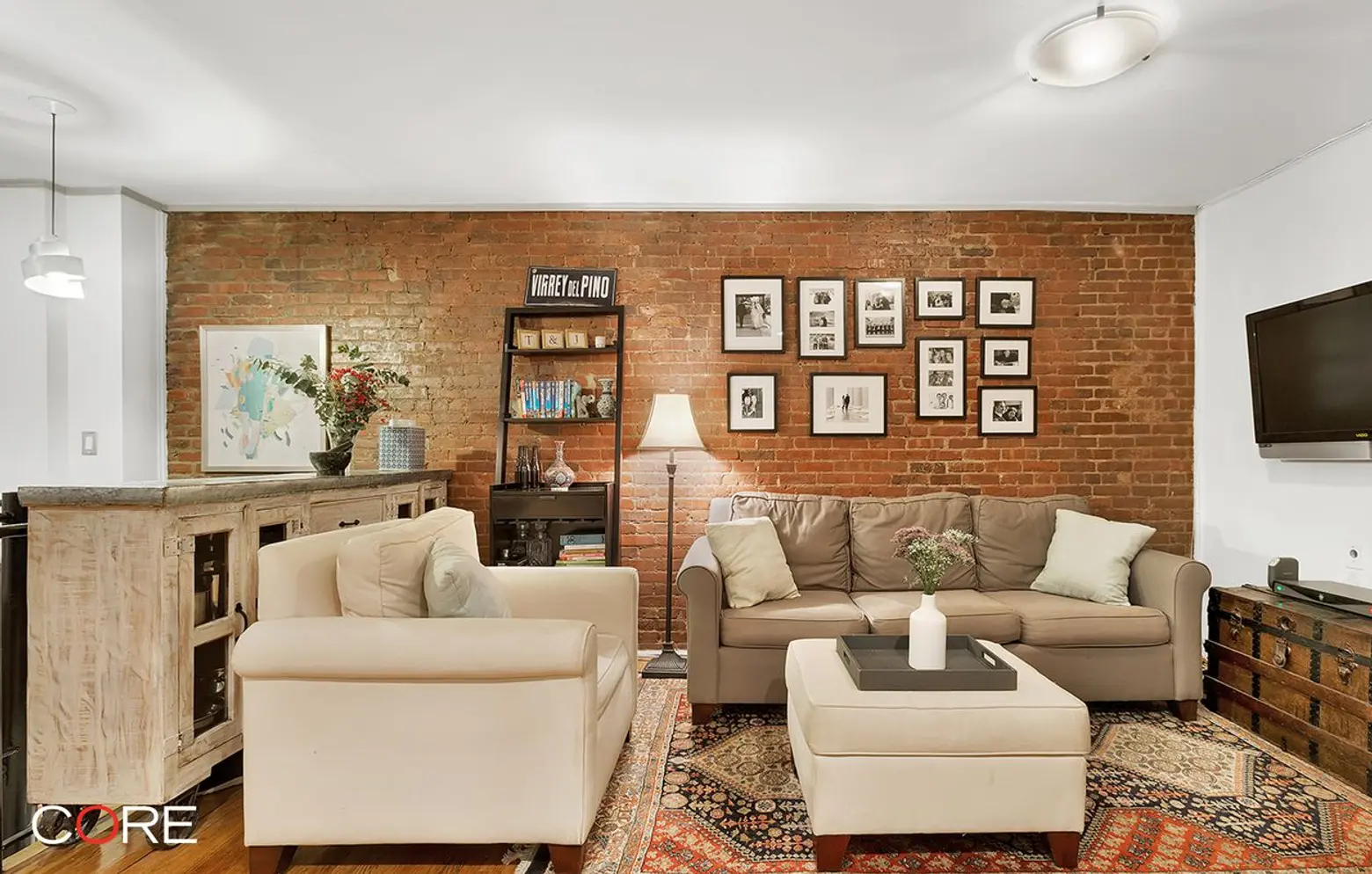 Exposed brick dominates at this $979K duplex on the Upper West Side