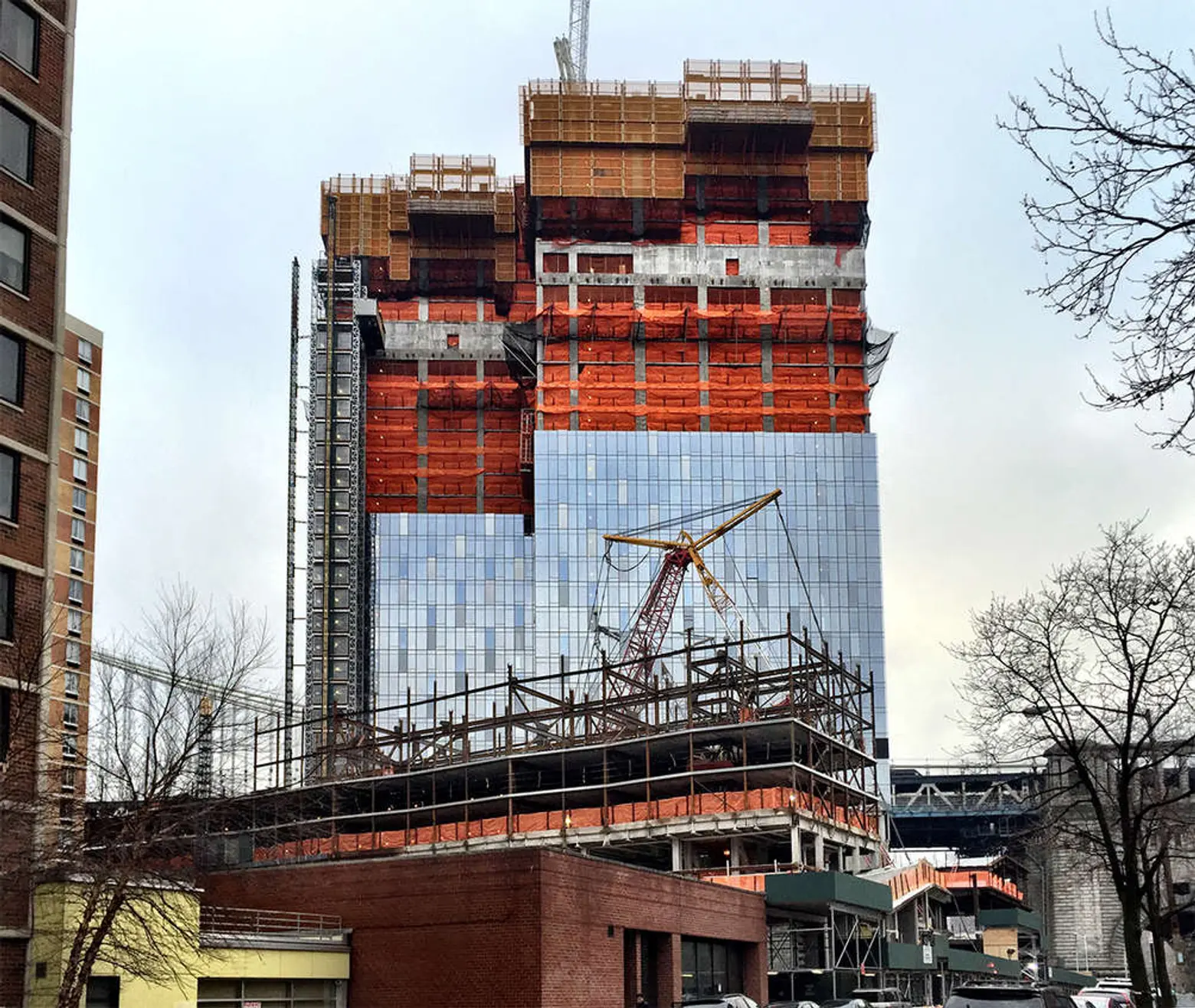 Extell’s One Manhattan Square reaches halfway point and gets its glassy skin