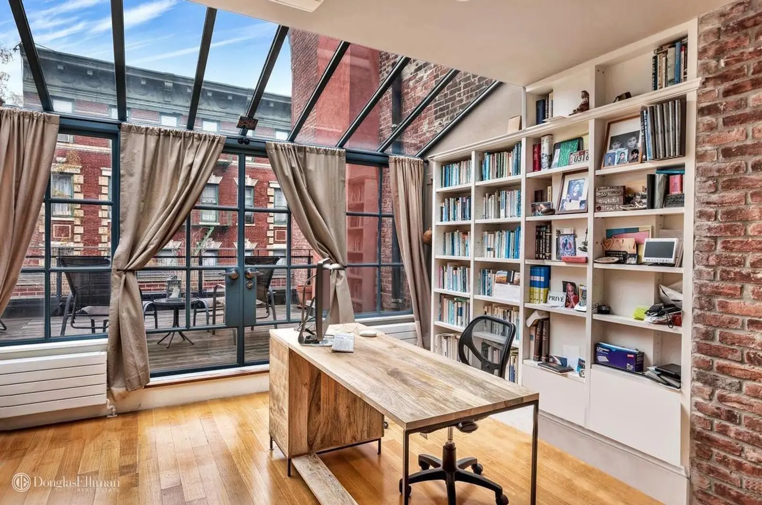 Sun worshippers: Rent this West Village townhouse with terraces and glass walls for $25K a month