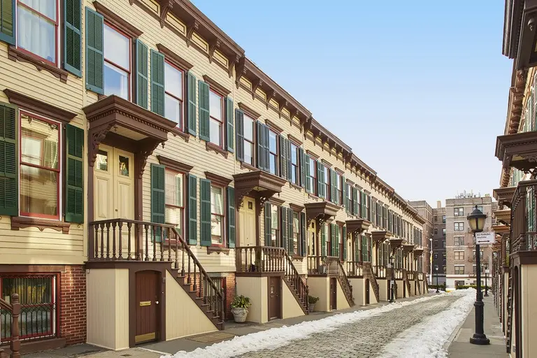 $1.6M Washington Heights row house is on a hidden historic street across from Manhattan’s oldest home