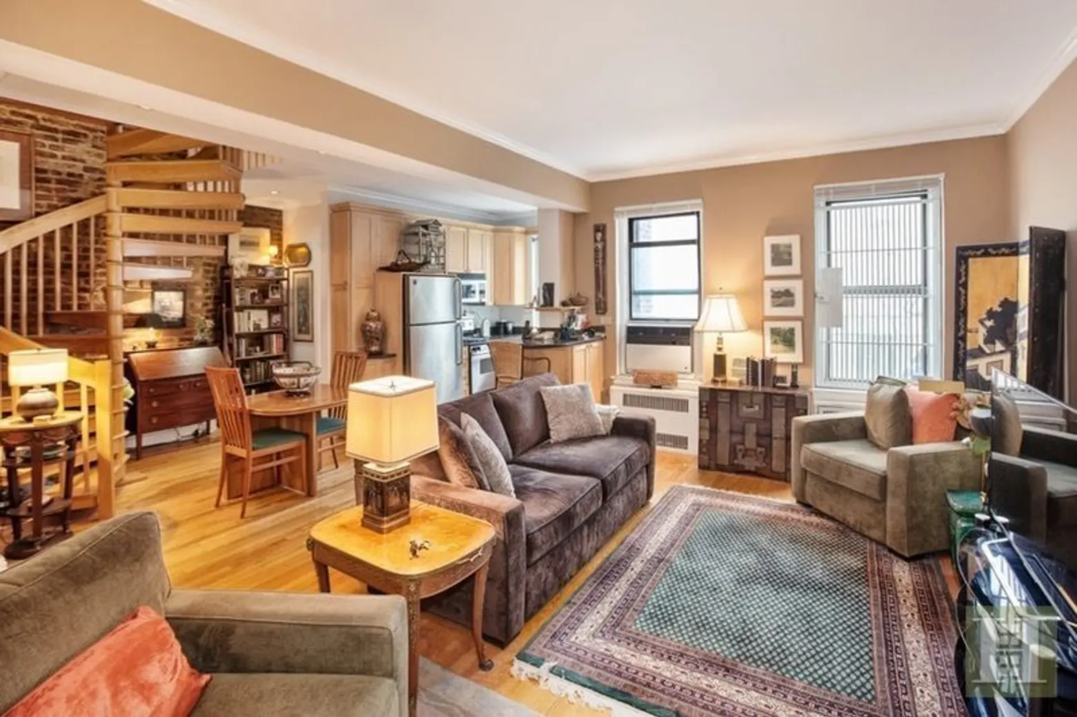 For $1M this Hell’s Kitchen duplex has lots of wood and brick and plenty of flexibility
