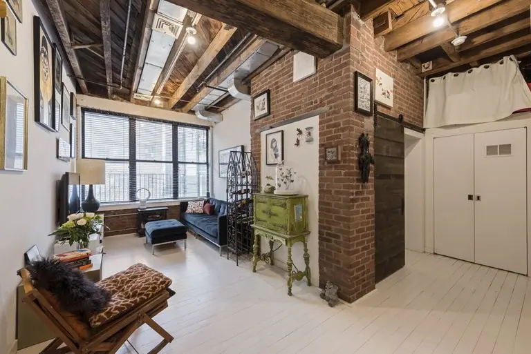Bakery-turned-condo in Williamsburg holds an incredible apartment lined with exposed brick and beams