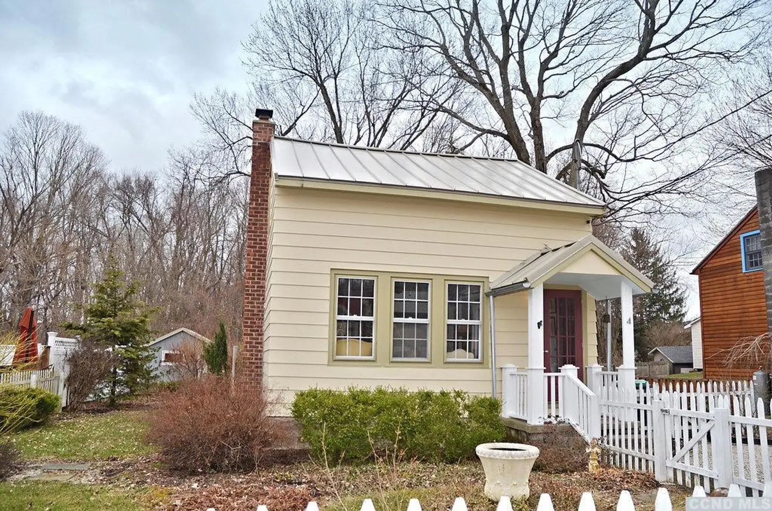 This quaint worker’s cottage could be your upstate retreat for just $165K