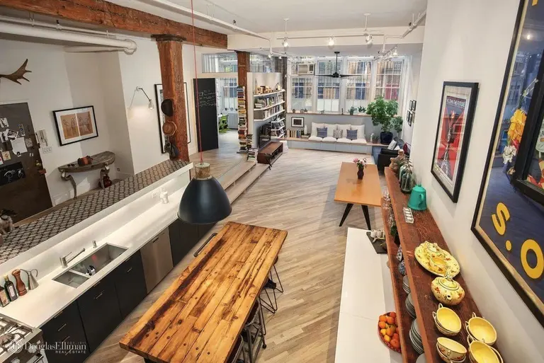 $2.7M Soho co-op shows off its 14-foot exposed wood beams