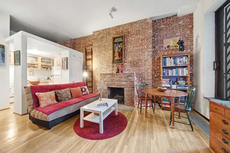 A fireplace and balcony make this $675K Upper West Side co-op a cozy all-season home