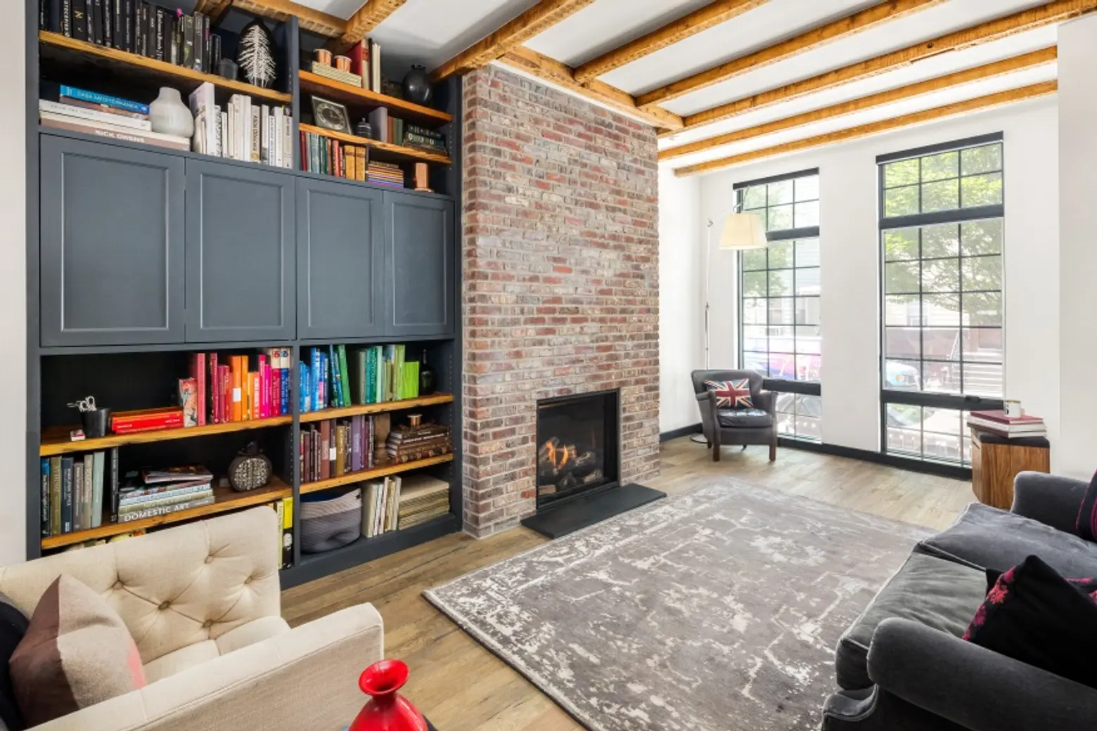 For $2.4M, this sun-filled brick Greenpoint townhouse wraps modern comfort in historic charm