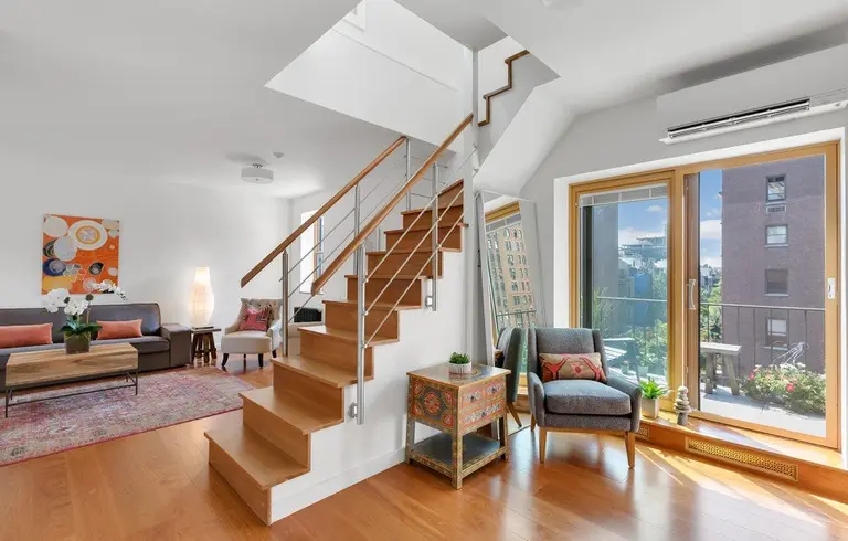 With two terraces and a fireplace, this $1.6M Chelsea duplex feels like a compact house