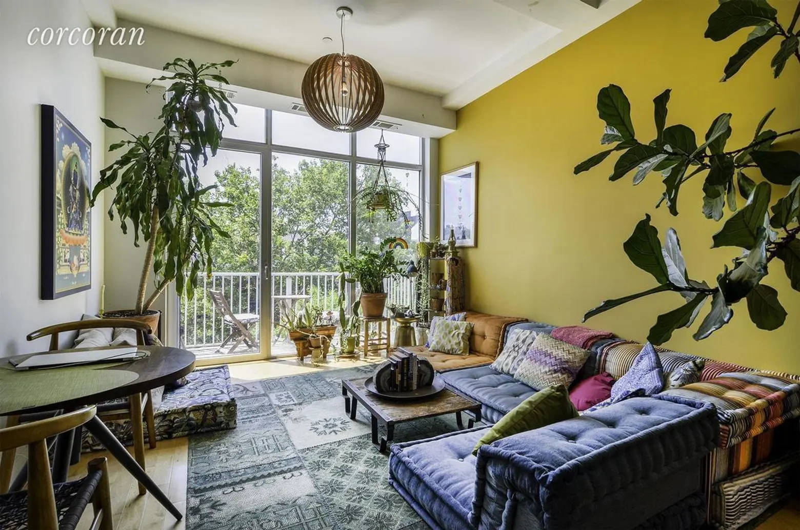 $3,250/month Williamsburg apartment comes furnished with chic, tropical decor