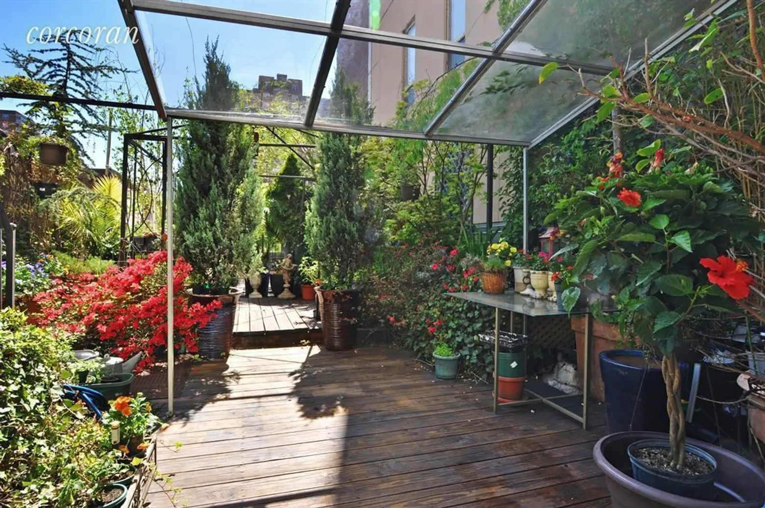$1.3M West Side duplex with a greenhouse and a double-decker roof is a gardener’s dream