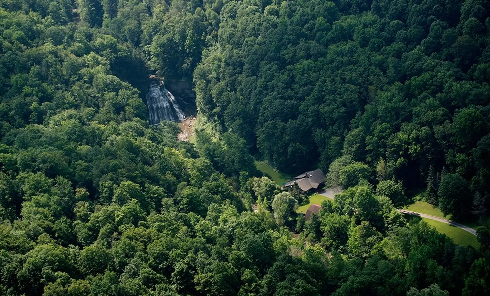 Own two waterfalls, 60 acres of land, and a cabin upstate for $925K
