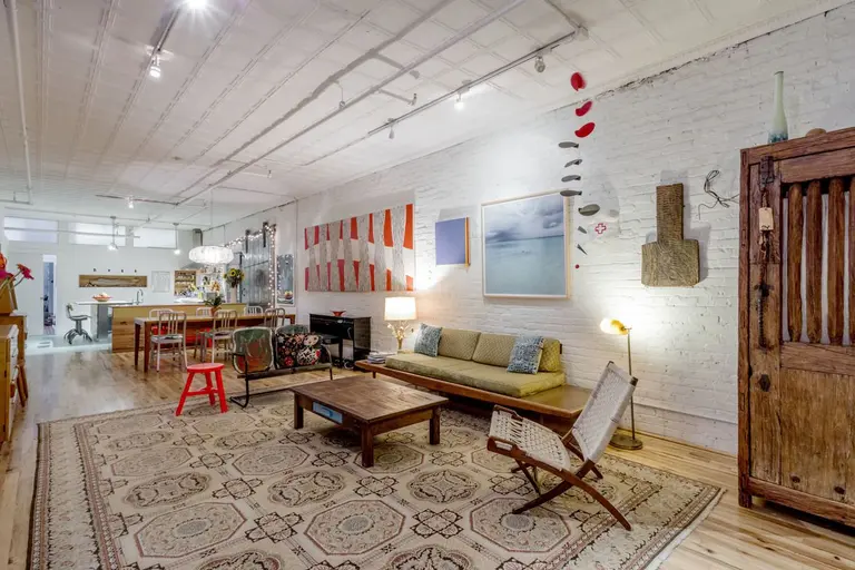 $3M full-floor loft embodies ‘old school Tribeca’ with tin ceilings and a steel fire door