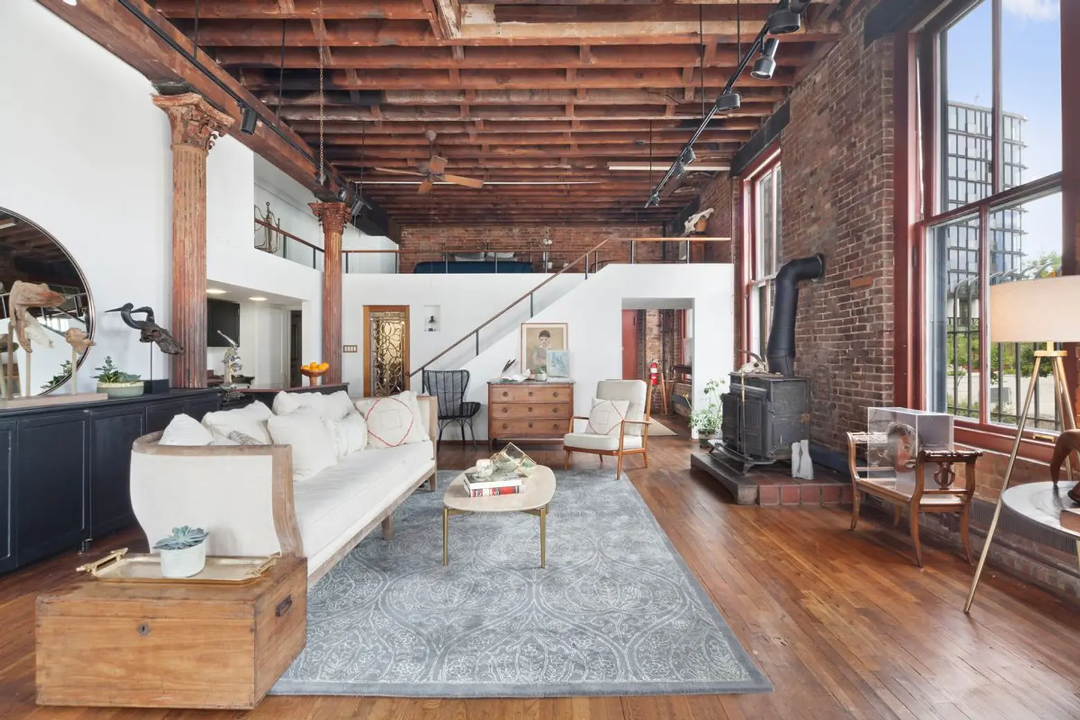 Rare and historic Dumbo triplex once owned by artist Caro Heller hits the market for $2M
