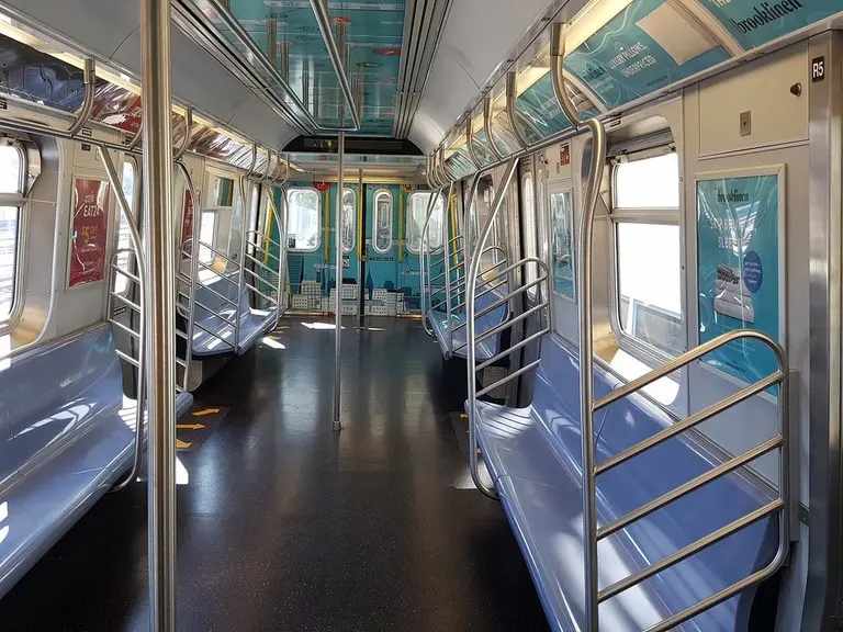 MTA refurbishes and removes seats from E train to squeeze more riders in cars