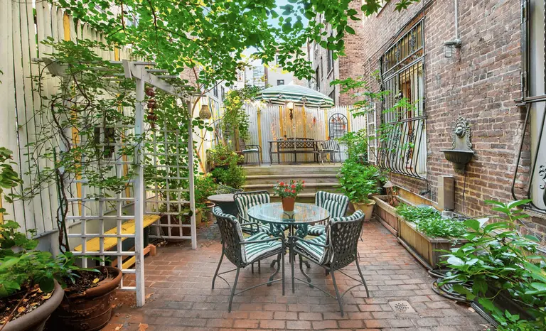 For $1.25M, Juliet balconies and an enchanted garden create romance on the Upper West Side
