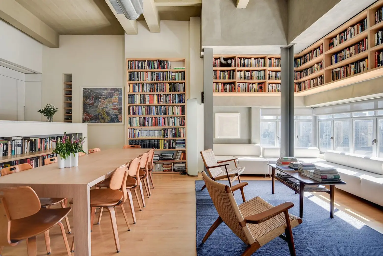 Run your own library from this $5M bookshelf-lined Central Park West loft