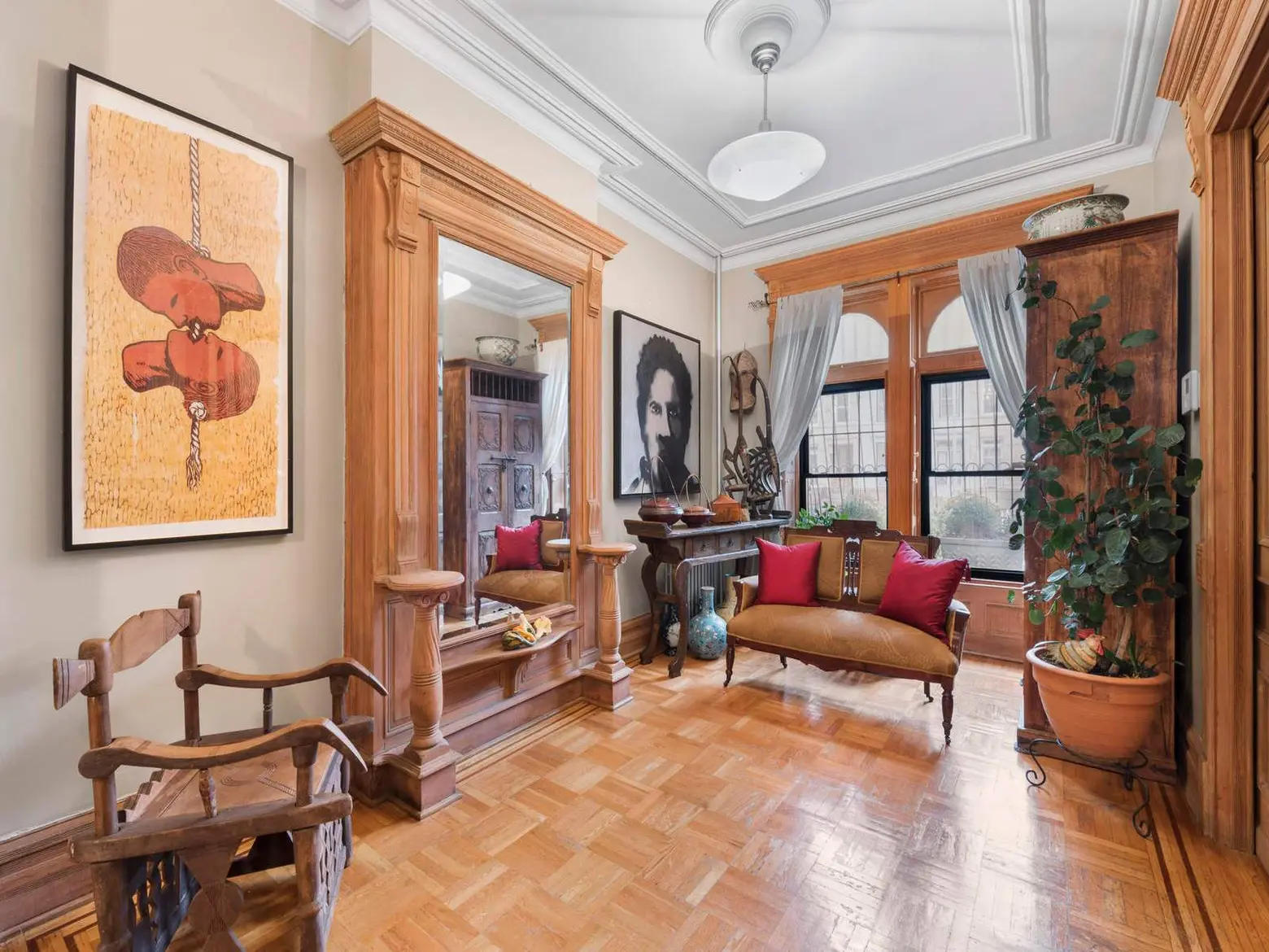 For $2.3M, an Amzi Hill-designed Bed-stuy townhouse with historic details and an artist’s legacy