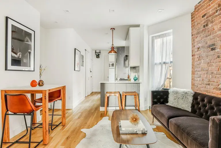 $1M West Village condo looks chic with high ceilings and exposed brick