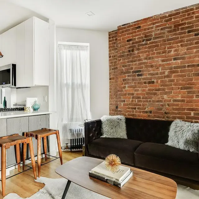 $1.05M West Village condo looks chic with high ceilings and exposed ...