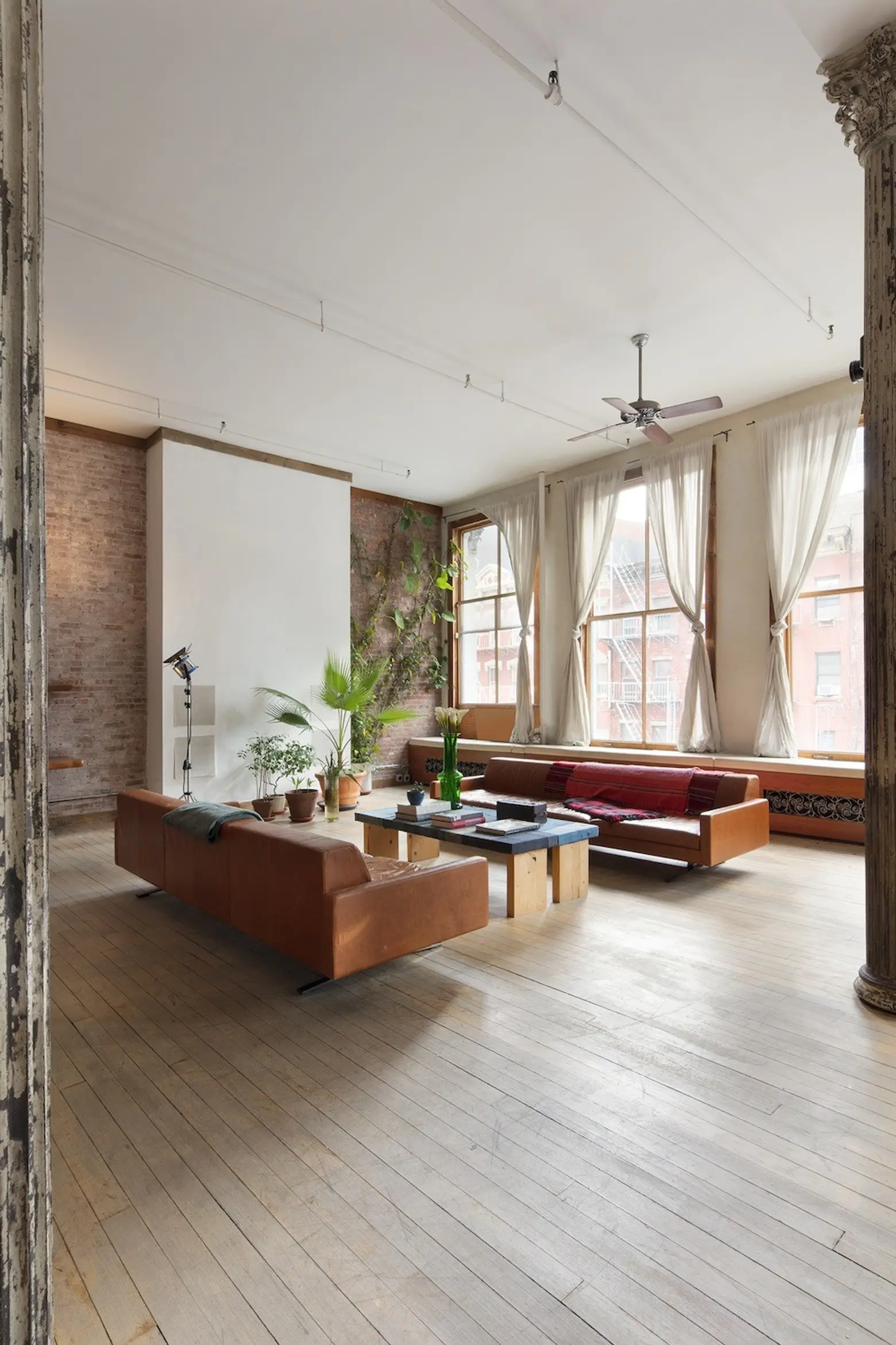 Authentic Soho artist loft owned by fashion photographer Greg Kadel asks  $4M