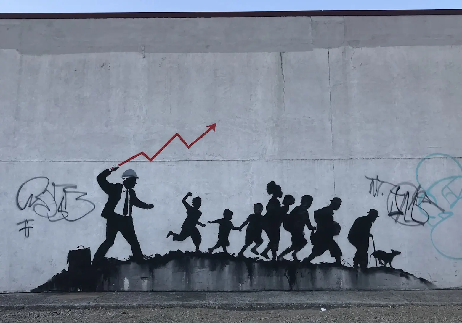 More Banksy work pops up in Brooklyn, this time commenting on capitalism and real estate