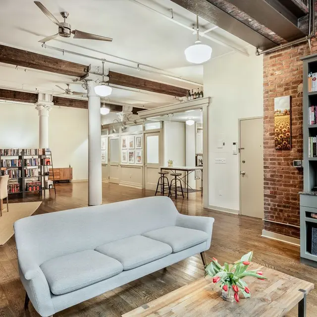 A wall of windows stuns at this $1.8M artsy loft in the heart of ...