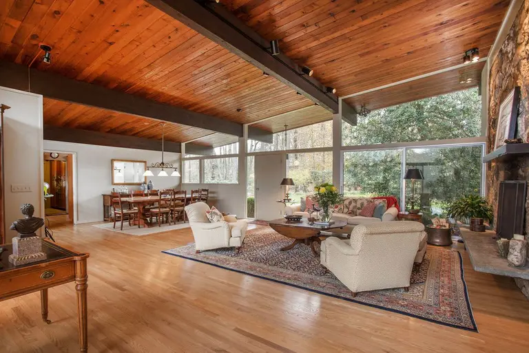 Live in a classic mid-century modern home on three acres of land in New Canaan for $1.5M