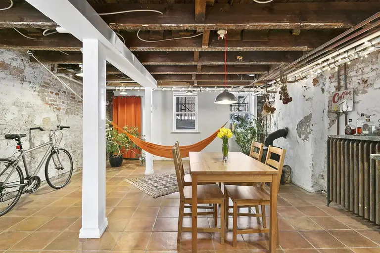 Asking $1.4M, this little Red Hook row house has a green roof and a magical garden