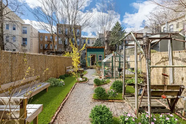 $2M Greenpoint home is warm weather-ready with a greenhouse, covered patio, and lovely landscaping