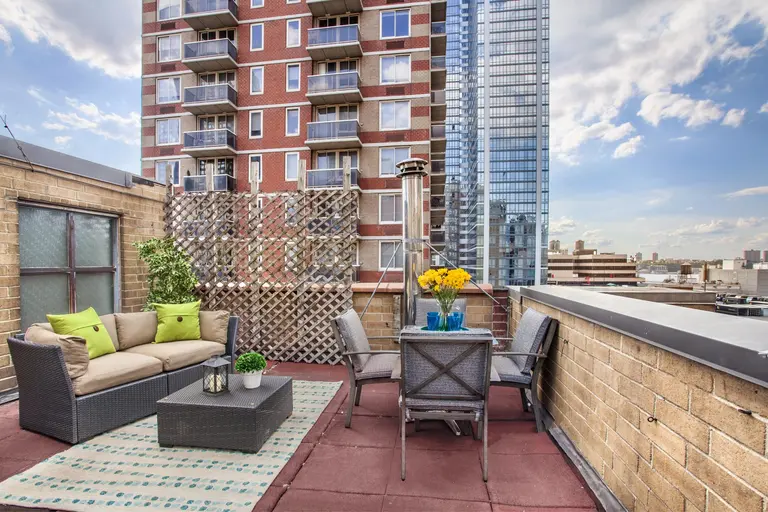 1.5M Midtown duplex has every season covered with a roof deck and a wood-burning fireplace