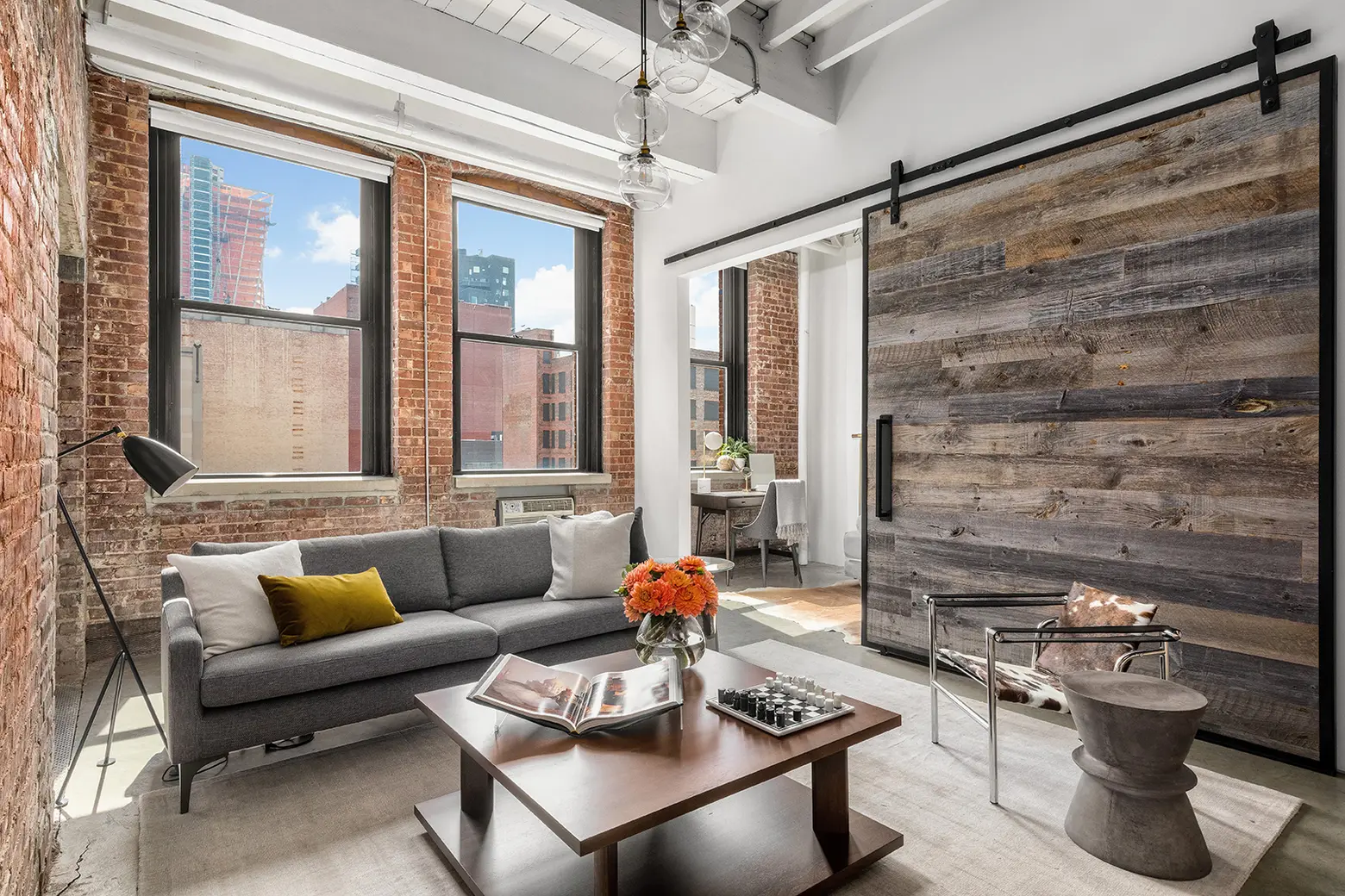 CNBC anchor Sara Eisen lists renovated, polished-rustic Chelsea loft for $2.6M