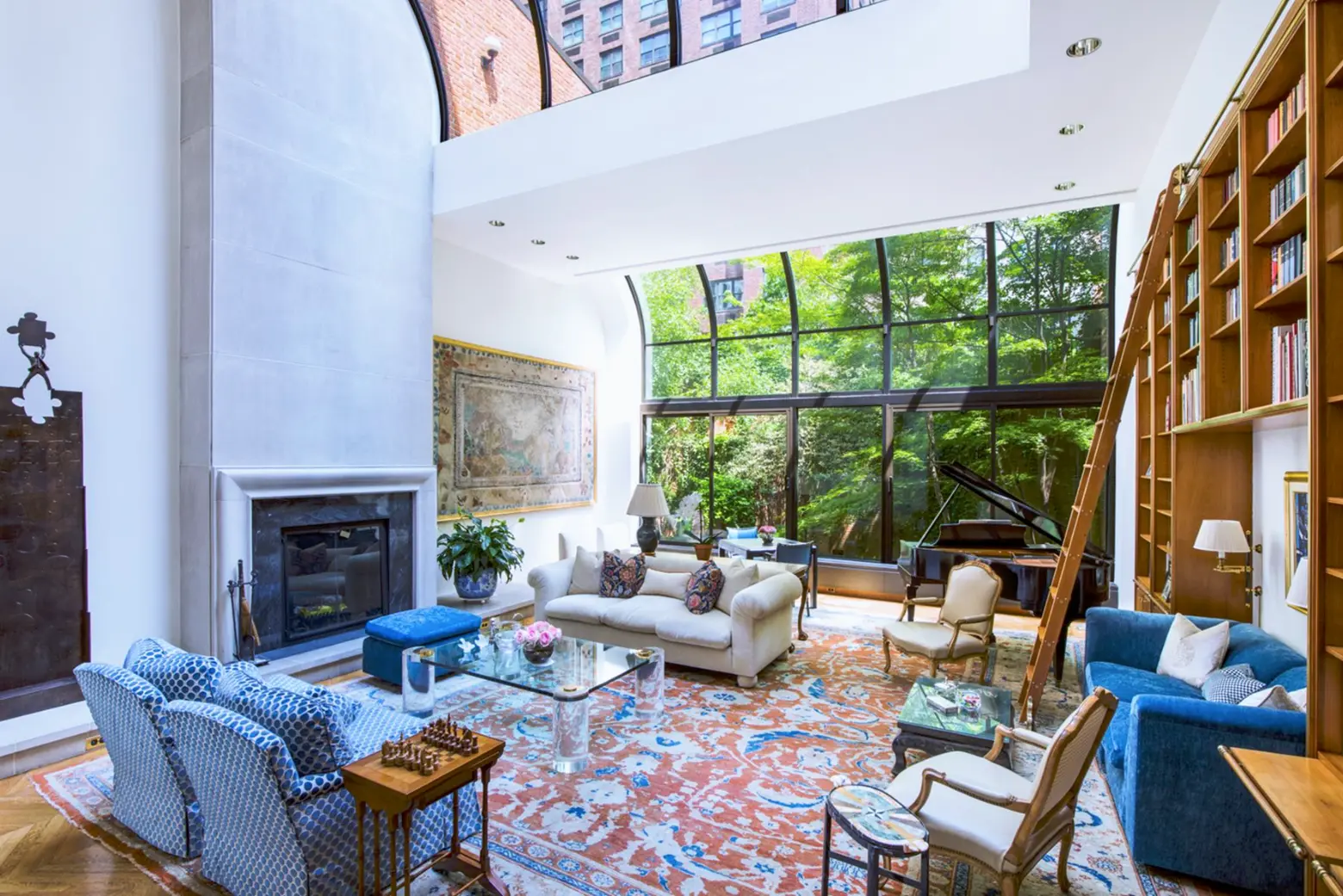 $13.5M UES mansion has a glass elevator, a 50-foot-wide garden, and two floors of the mansion next door