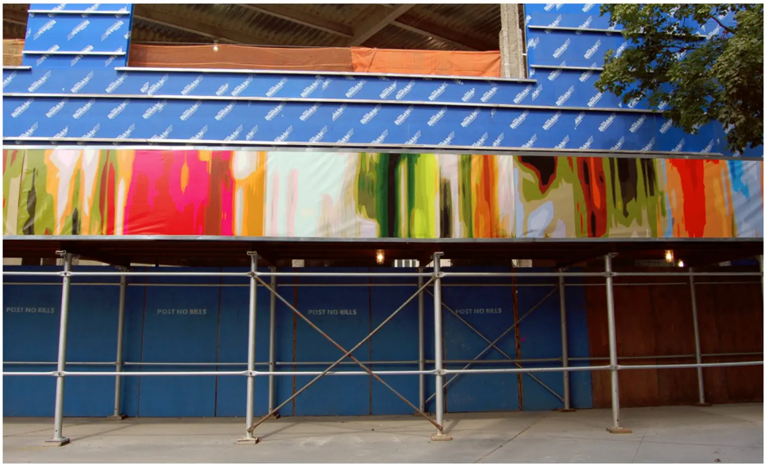 City calls on artists to add flair to drab construction fences in two-year pilot program