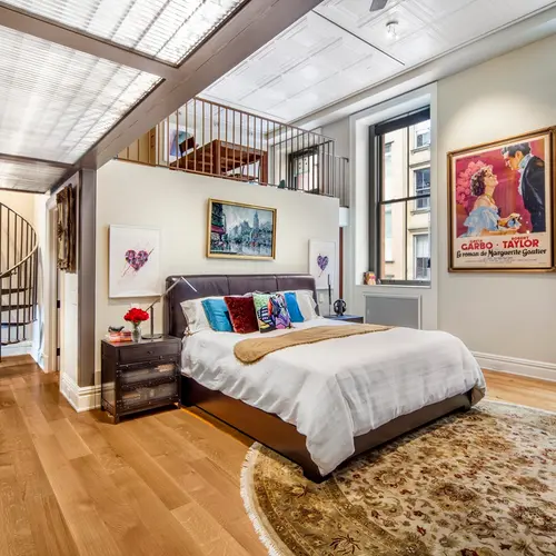 Sleep right under the tin ceilings at this $3.9M Soho co-op with a ...