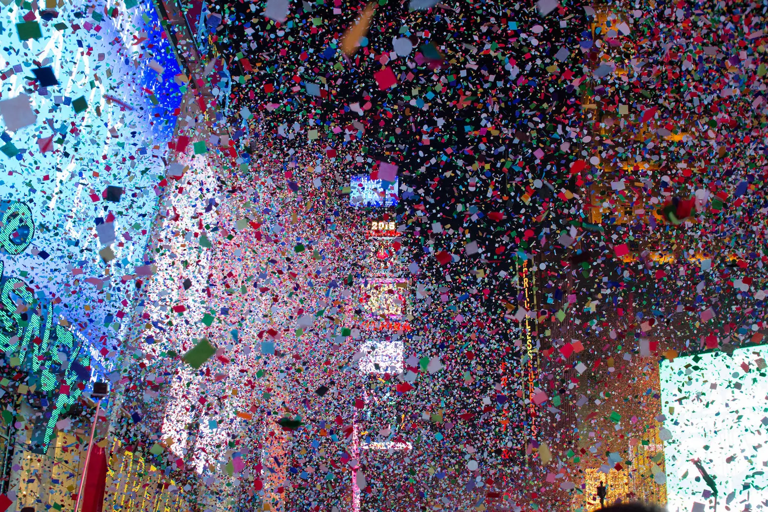 Confetti falls on a deserted Times Square as New York forges ahead. - The  New York Times