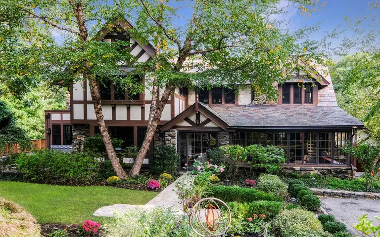 It’s said this $1.85M Scarsdale Tudor was built by mobster Bugsy Siegel in 1920