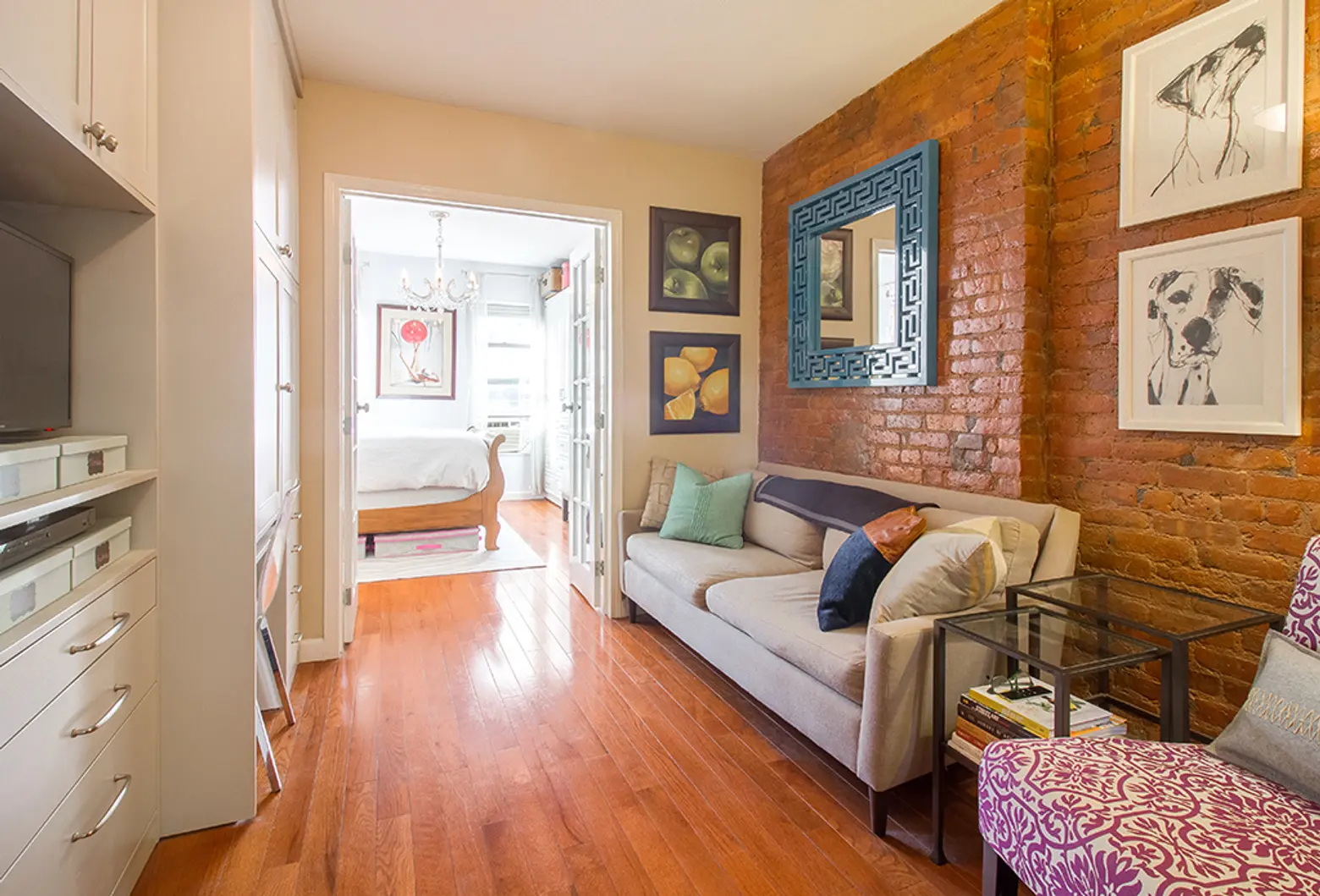 Exposed brick, built-ins, and a shoe closet make this $389K Upper East Side one-bedroom a shoo-in