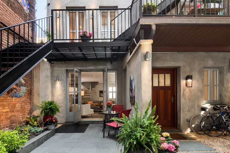 $3.5M East Village carriage house boasts a private courtyard and an expansive roof terrace