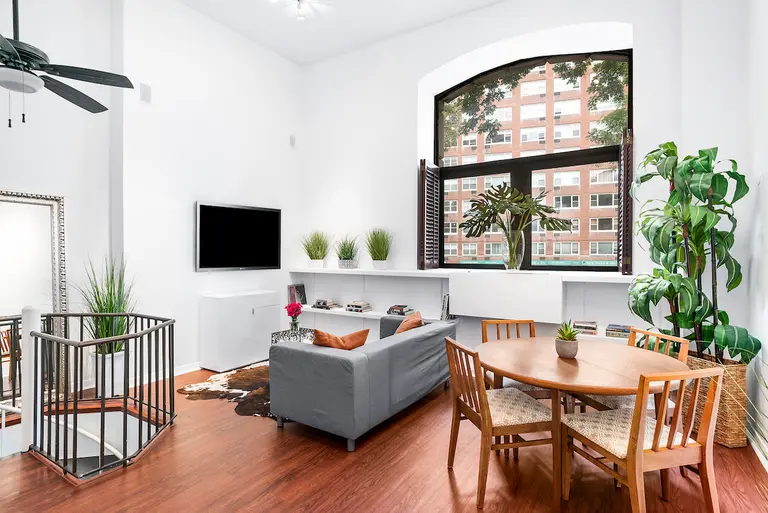 This $1.1M duplex is on the main floor of an old Soho police precinct