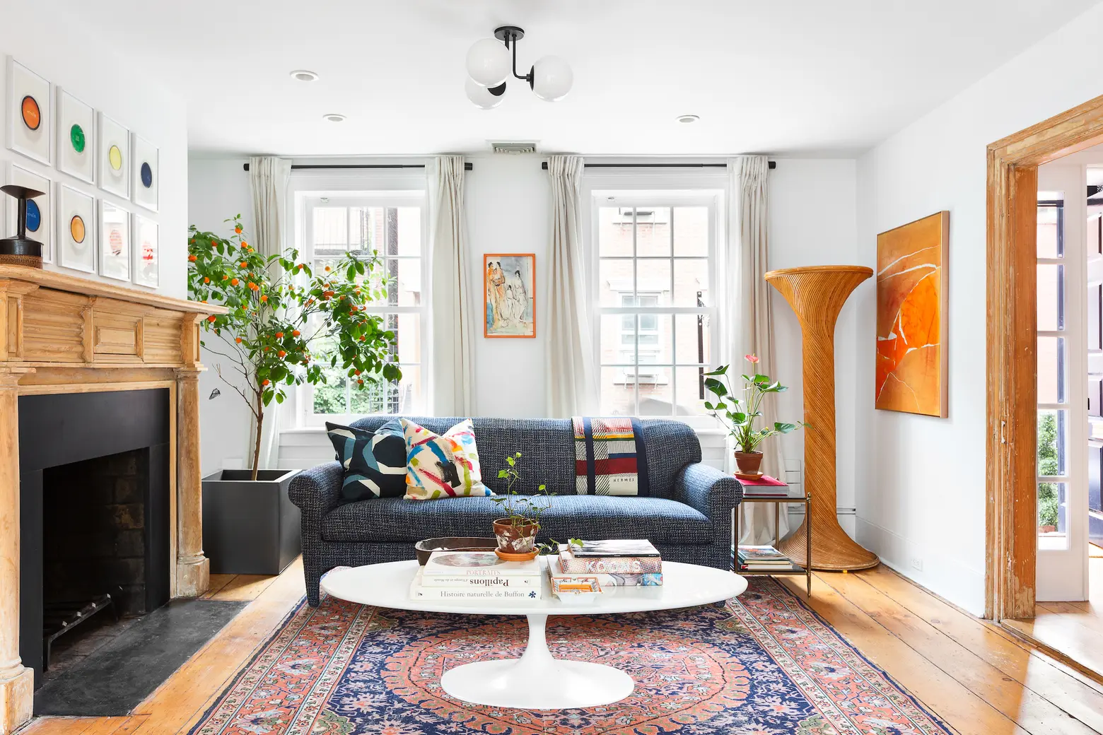 A renovated Federal-era West Village home with a solarium seeks $5.1M