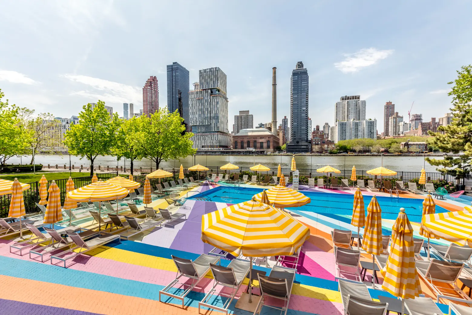 Roosevelt Island’s Manhattan Park pool transforms into a technicolor dreamscape for the summer