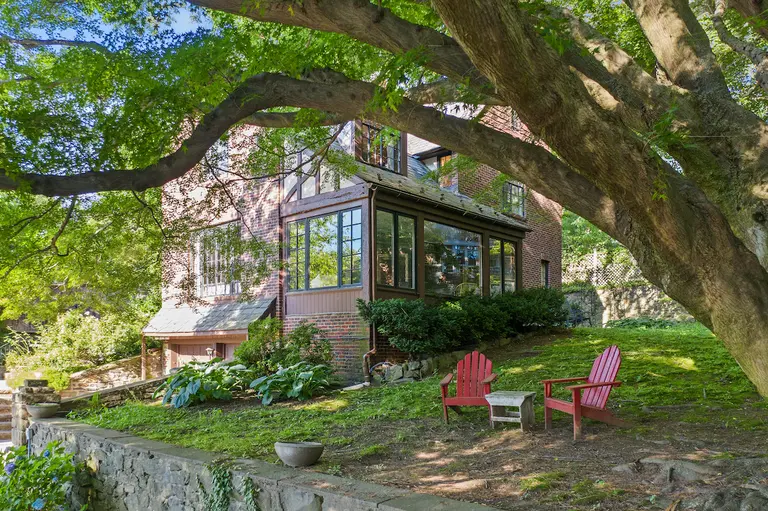 For $1.9M, this tranquil Tudor on the banks of the Hudson is surrounded by greenery and views