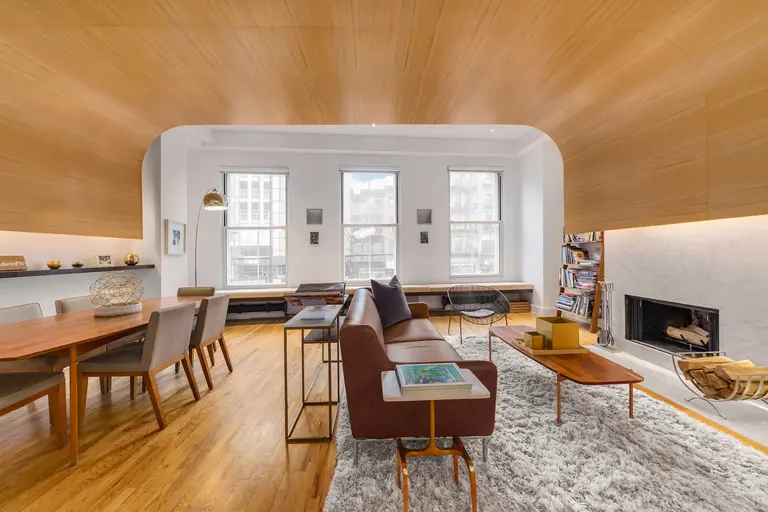 12K/month Lower East Side loft on the Bowery features a boat-like wooden ceiling