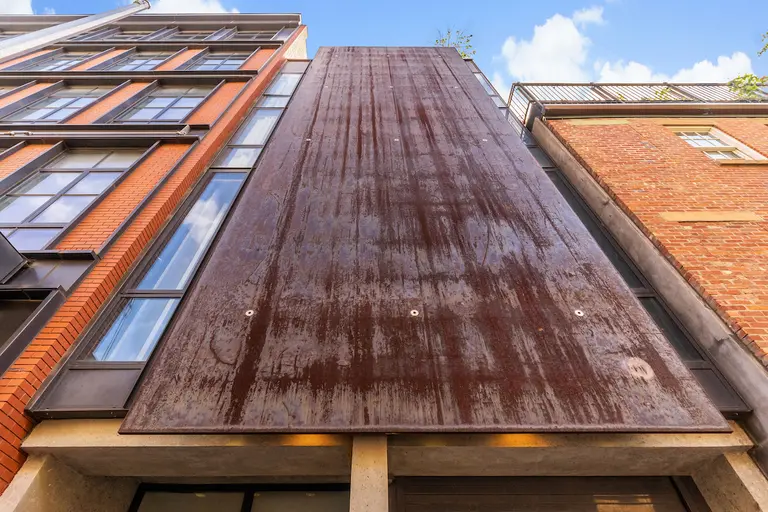 This $20M West Village townhouse has a rear wall of glass and a 40-foot-high steel facade
