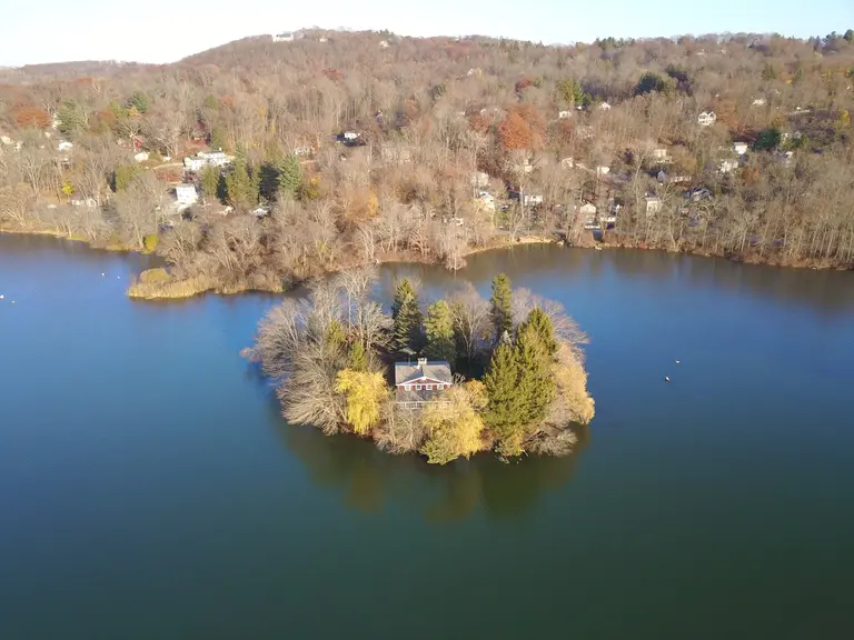 You can buy this house on a private island upstate for $850K, but you can only get there by boat