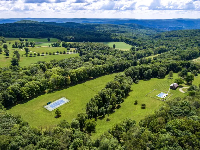 For $3M, this 125-acre upstate farm has a barn and a log cabin pool house