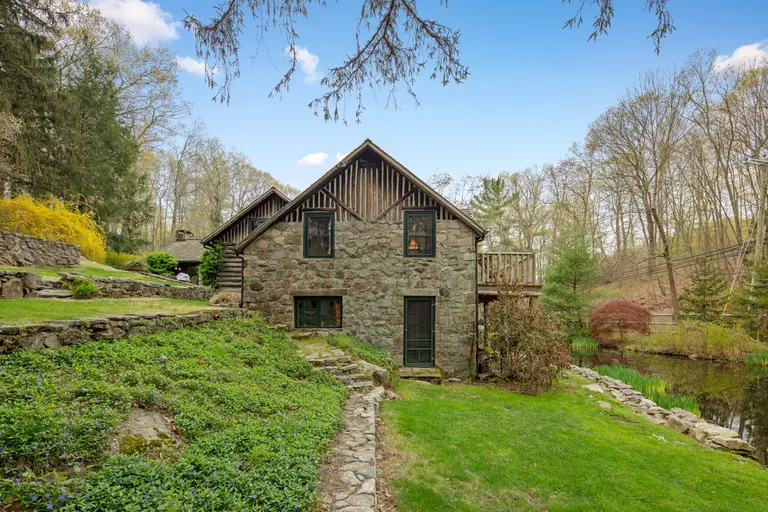 Every day could be a camping adventure at this $998K Connecticut log and stone country home