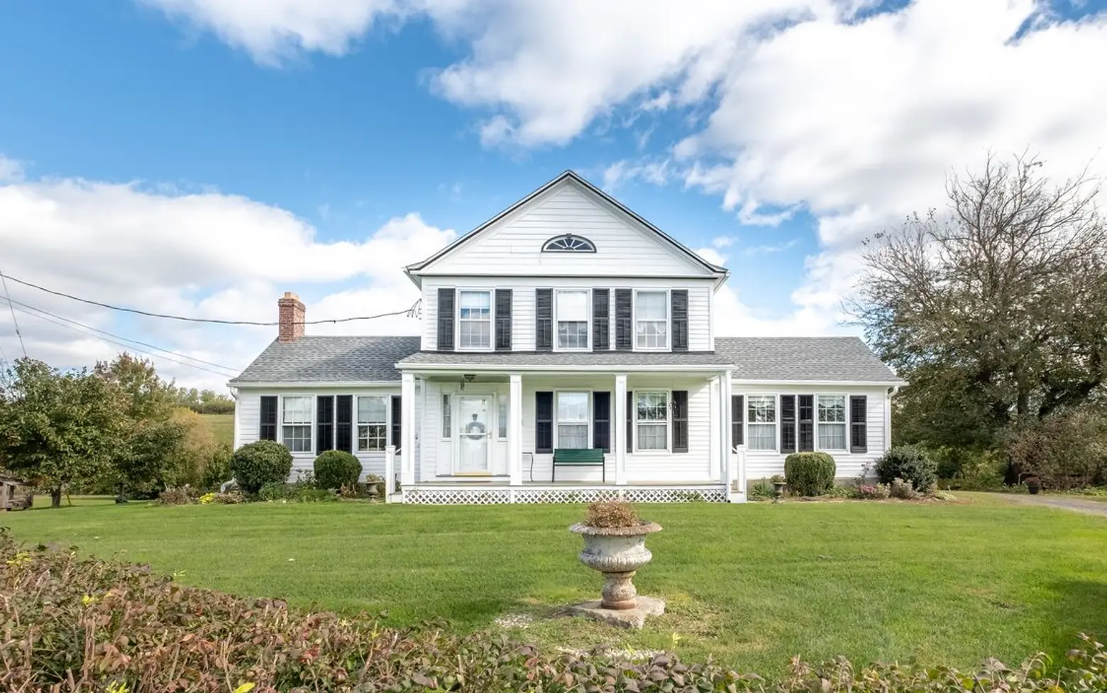 This upstate farmhouse comes with 30+ acres and an abundant fruit orchard for just under $700K