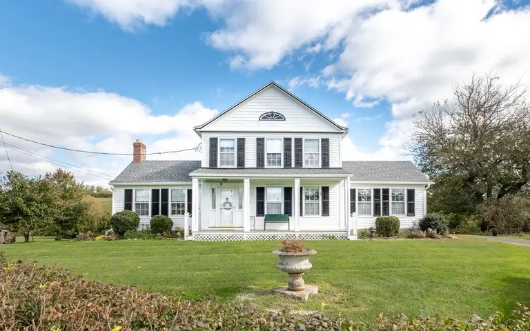 This upstate farmhouse comes with 30+ acres and an abundant fruit orchard for just under $700K