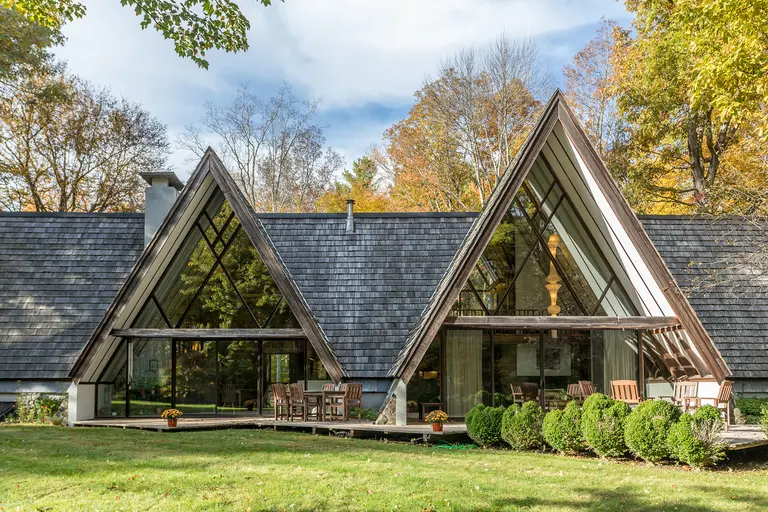 Mid-century-modern meets rustic retreat at this $835K A-frame home in Connecticut