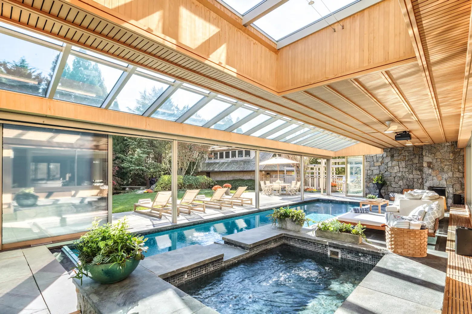 This resort-like $9.5M Hamptons home has an indoor/outdoor pool off the kitchen